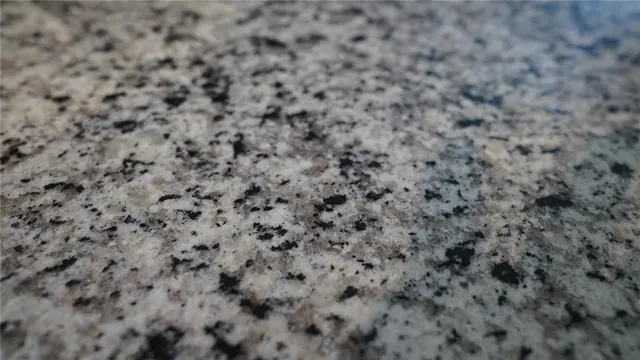 a close up of a white marble wall