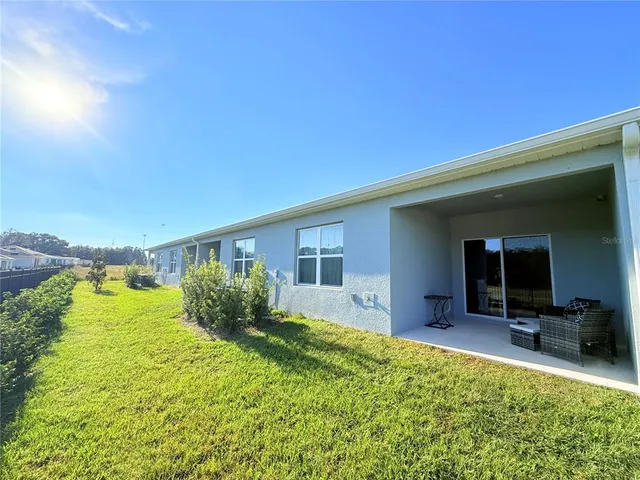 a view of an empty room and a windows