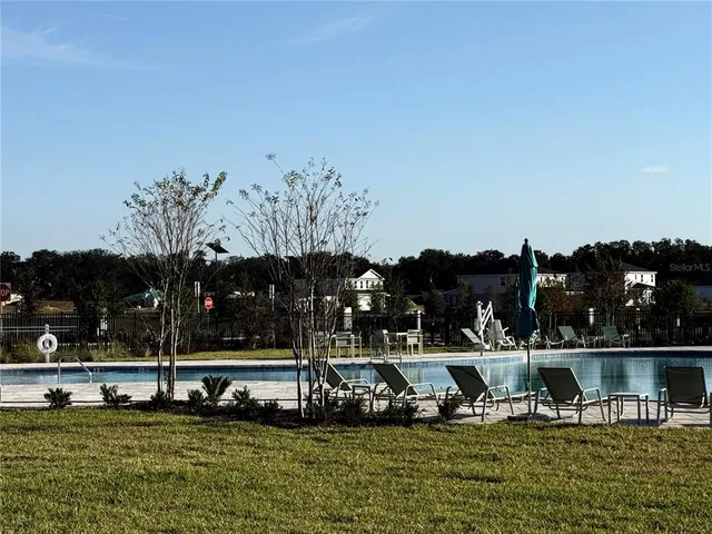 a view of a large body of water with water fall