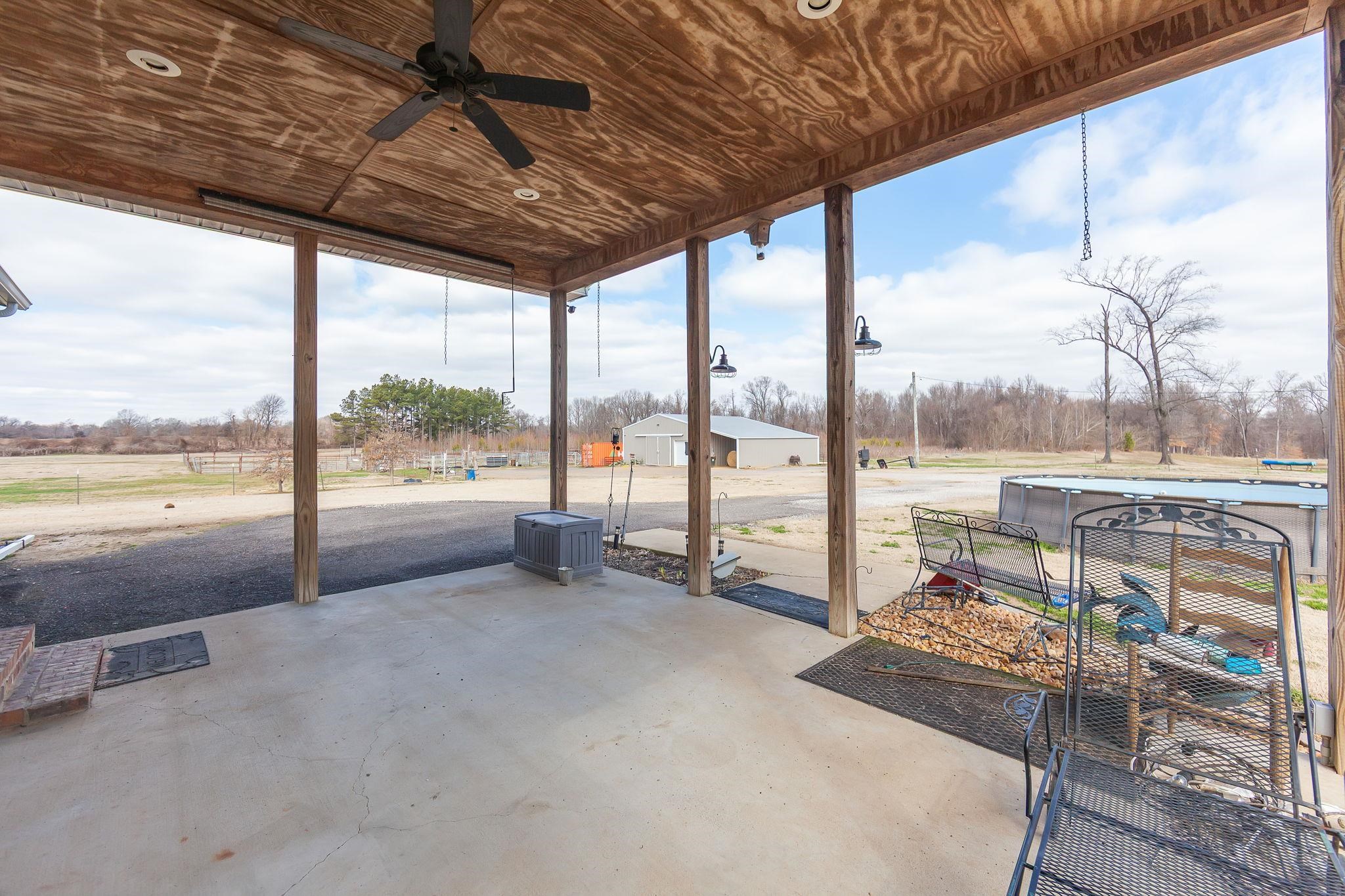 2656 Curve Woodville Road Ripley, TN 38063 - Photo 29 of 39 a view of a floor to ceiling window in an outdoor space