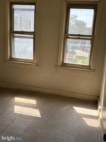 a view of a window in an empty room