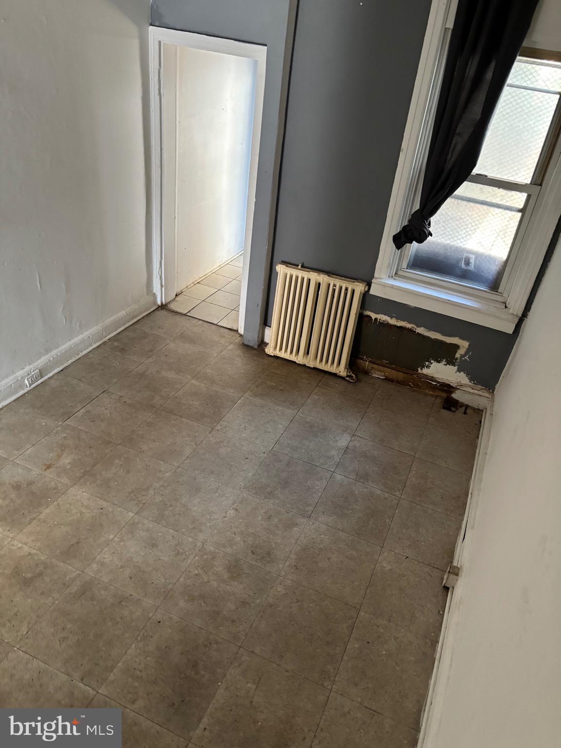 2507 Mutter Street Philadelphia, PA 19133 - Photo 2 of 26 a view of an empty room with stairs