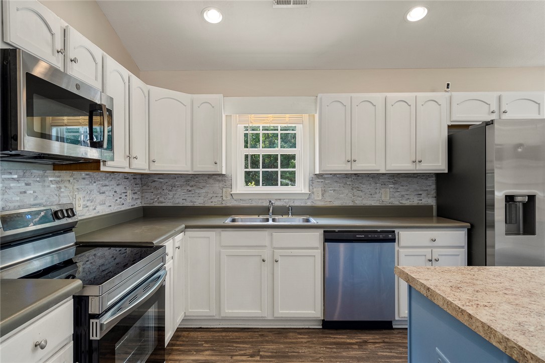 167 Mediterranean Avenue Anderson, SC 29621 - Photo 15 of 33 A well-equipped kitchen features modern stainless steel appliances and abundant cabinetry for storage.
