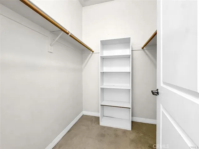 a view of an empty walk in closet