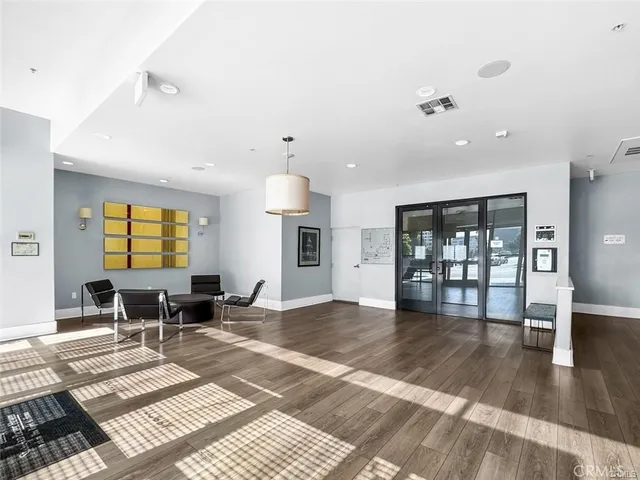a view of a living room and dining room