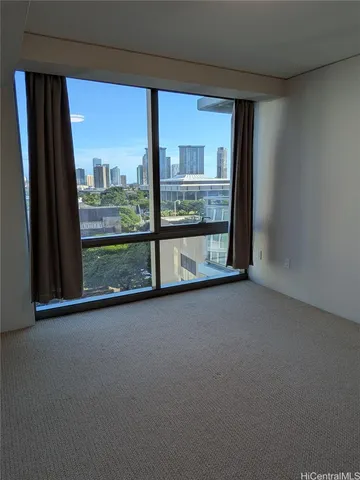 a view of a room with a large window