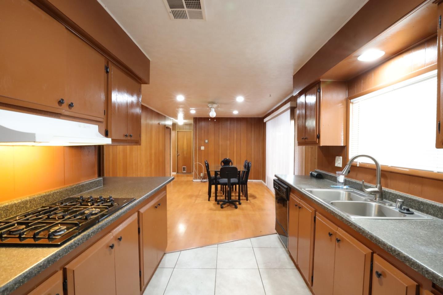 2151 Oakland Road, Unit 119 San Jose, CA 95131 - Photo 3 of 15 a kitchen with stainless steel appliances granite countertop a sink stove and cabinets