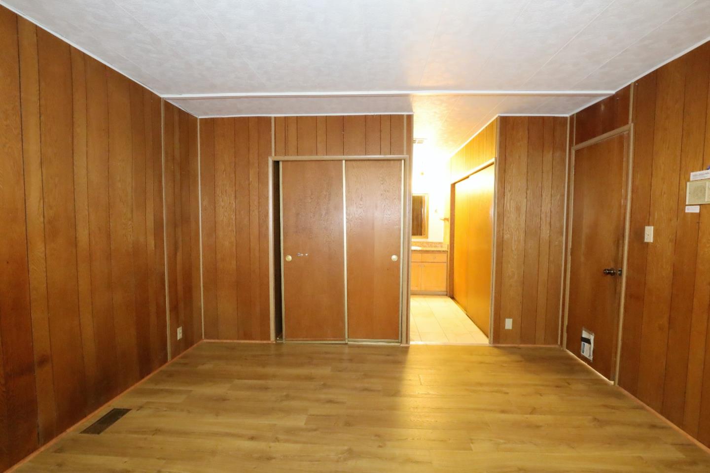 2151 Oakland Road, Unit 119 San Jose, CA 95131 - Photo 8 of 15 a view of an empty room with wooden floor