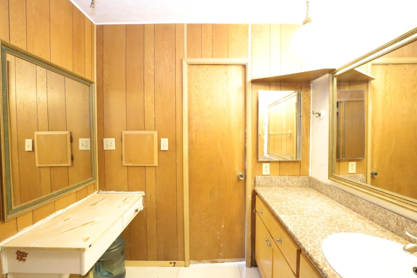 2151 Oakland Road, Unit 119 San Jose, CA 95131 - Photo 10 of 15 a bathroom with a granite countertop sink and a bathtub
