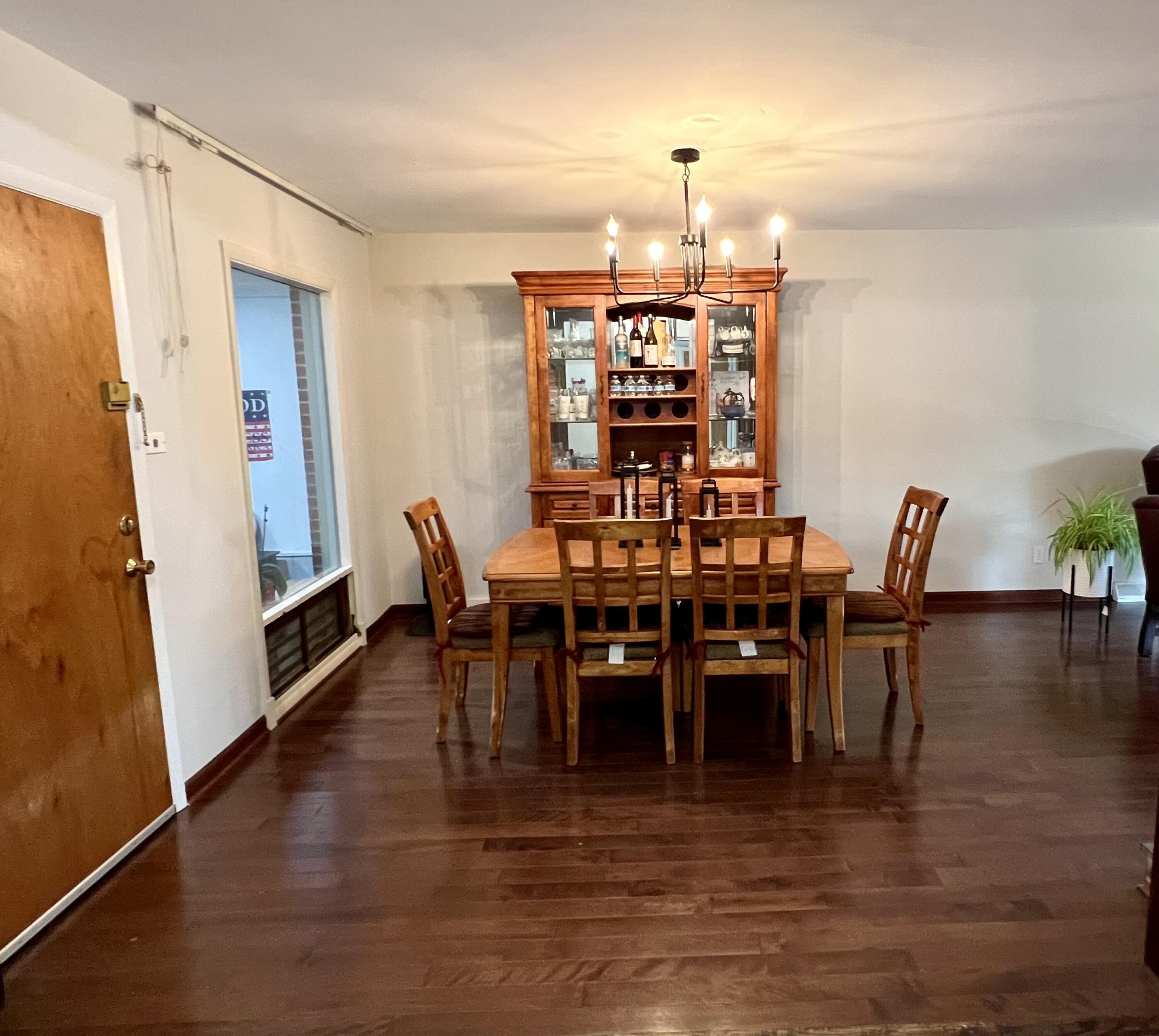 1511 Park Drive Munster, IN 46321 - Photo 15 of 23 a view of a dining room with furniture and wooden floor