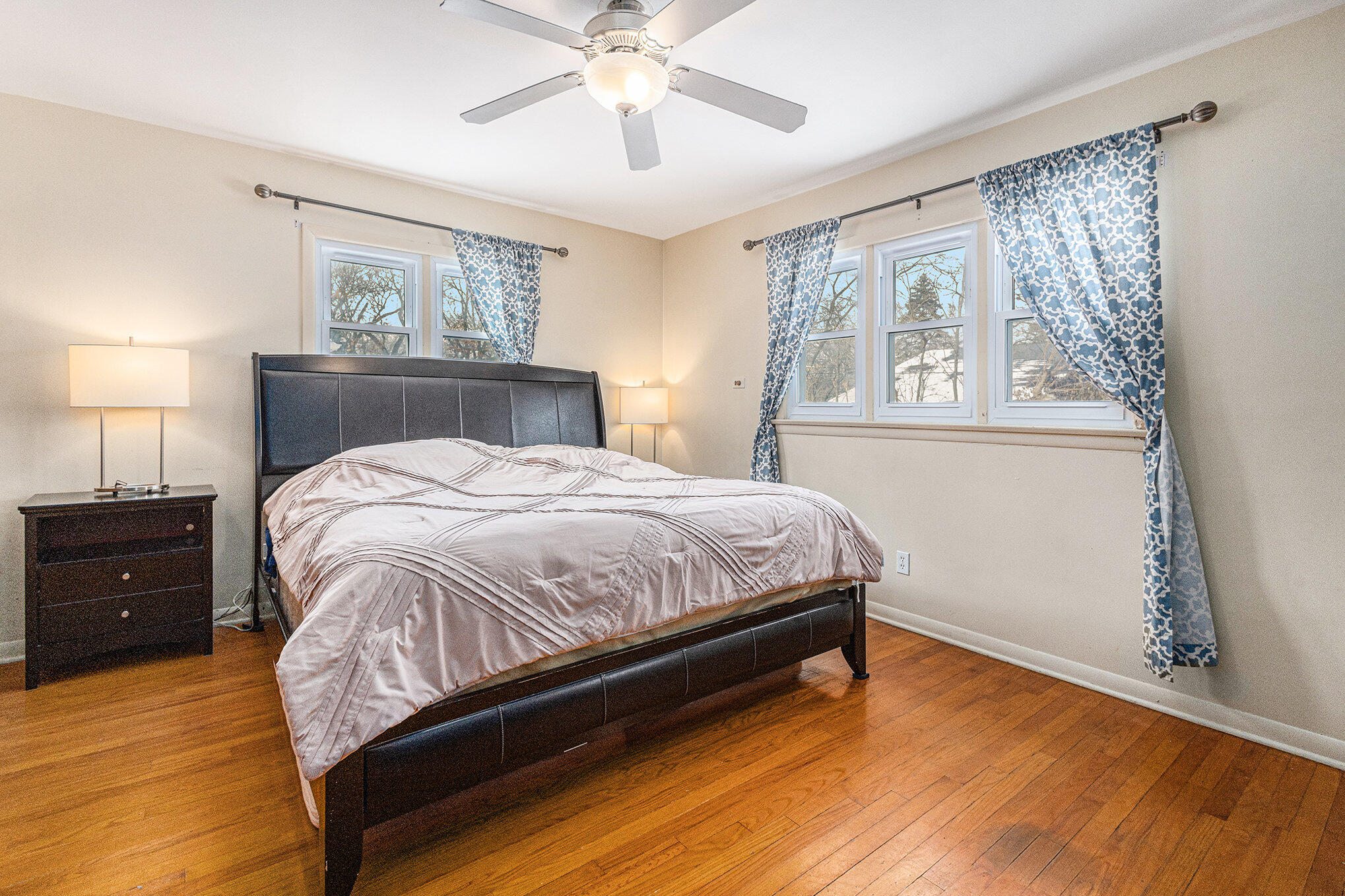 1511 Park Drive Munster, IN 46321 - Photo 16 of 23 a bed sitting in a bedroom next to a window