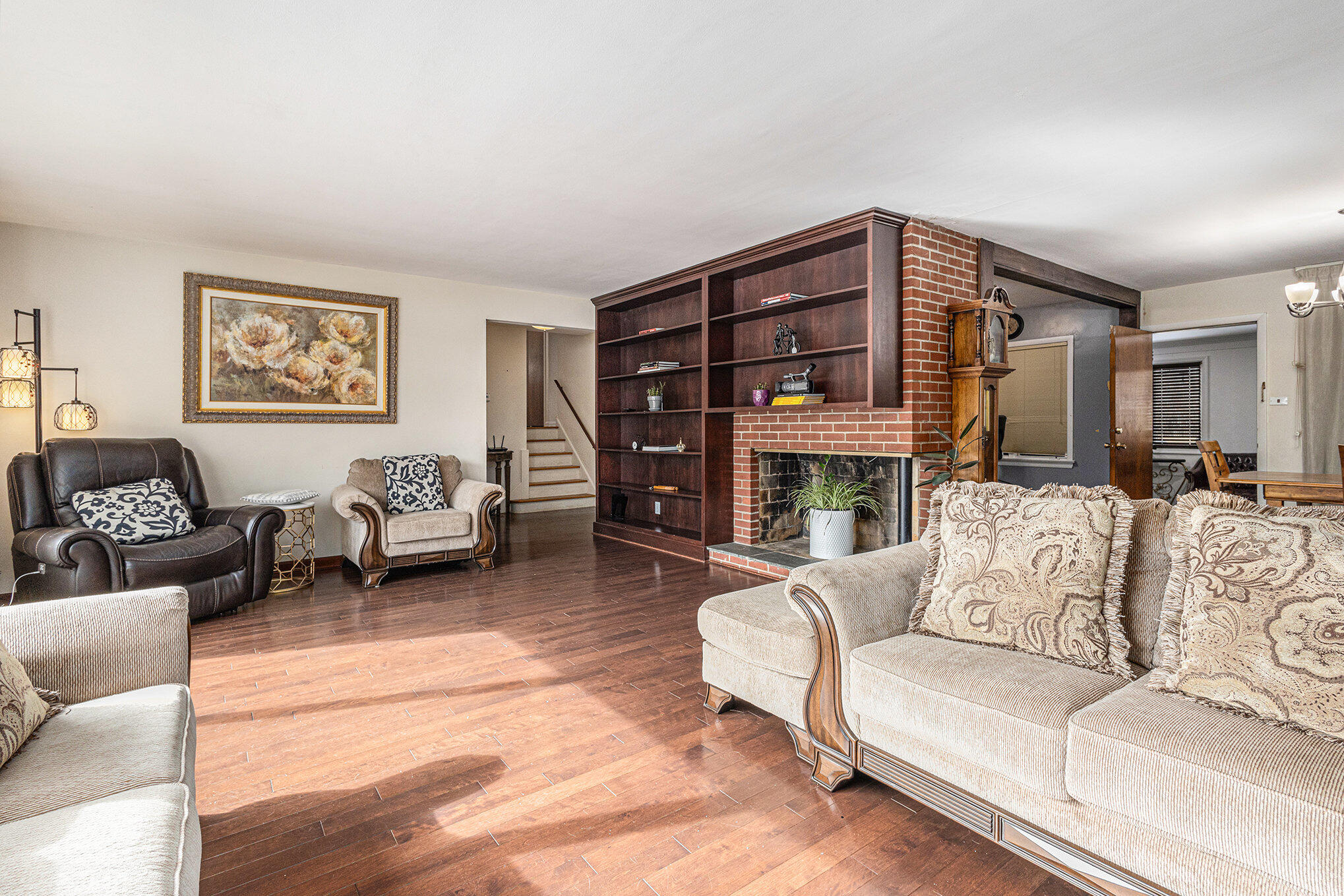 1511 Park Drive Munster, IN 46321 - Photo 10 of 23 a living room with furniture and a fireplace