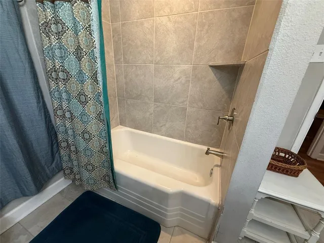 a bathroom with a bathtub