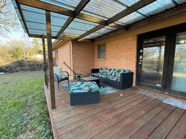 a backyard of a house with seating space