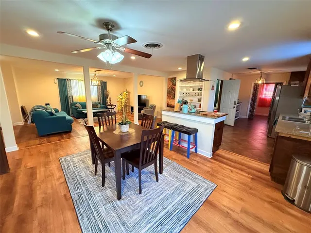 a view of a dining room with furniture