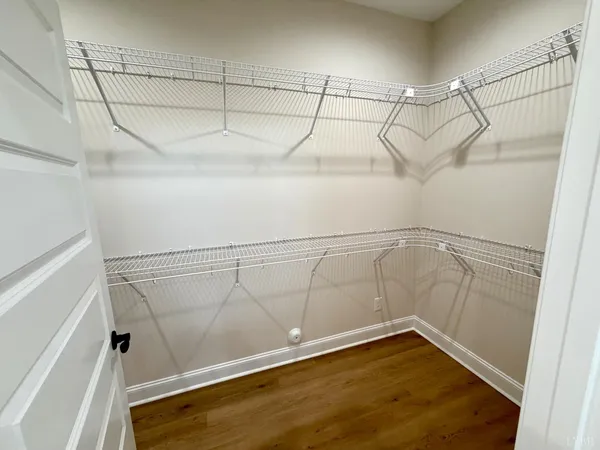 a view of a room with racks on the wall