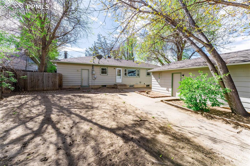 2818 Templeton Gap Road Colorado Springs, CO 80907 - Photo 19 of 27 front view of a house with a yard