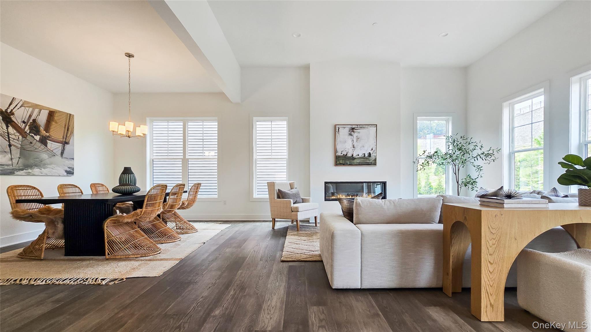 2069 Summit Loop, Unit 98 Carmel, NY 10512 - Photo 10 of 21 a living room with furniture wooden floor and a large window