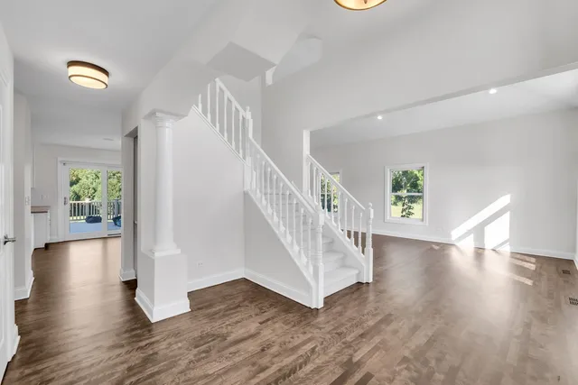 a view of entryway with wooden floor