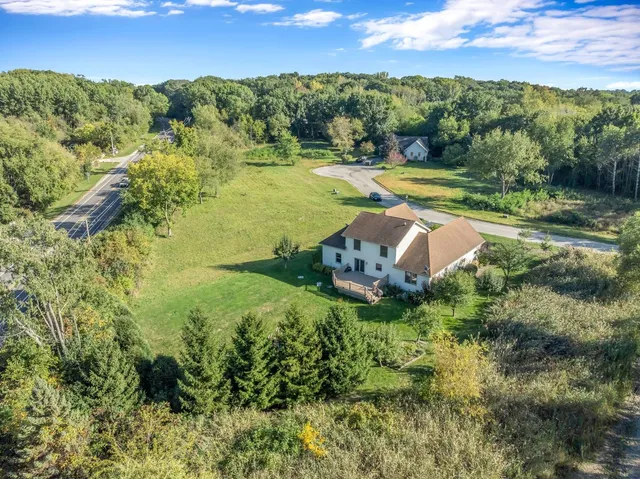 a view of a lake with a yard