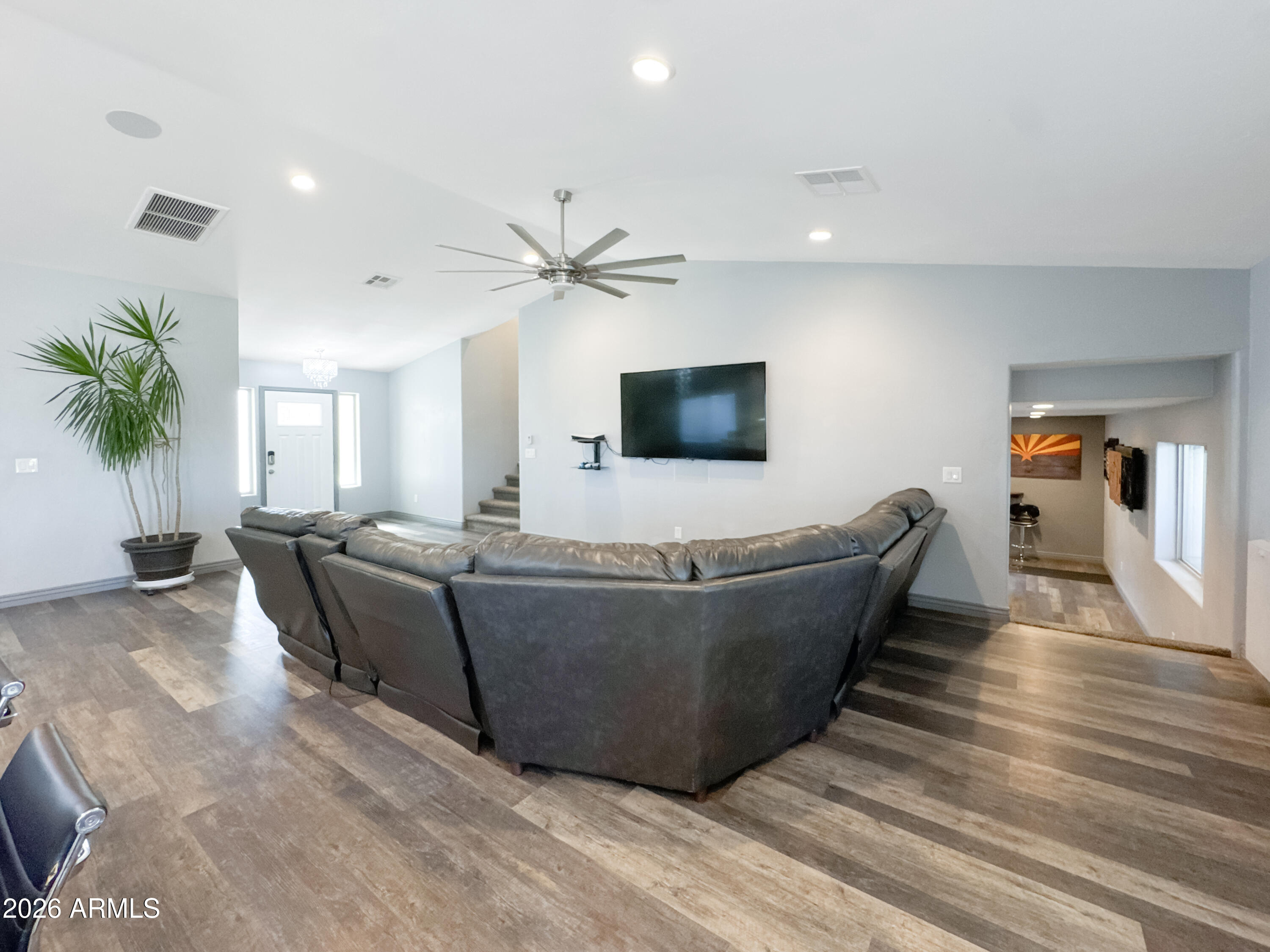 603 North Almar Circle Mesa, AZ 85213 - Photo 11 of 31 a living room with furniture and a flat screen tv