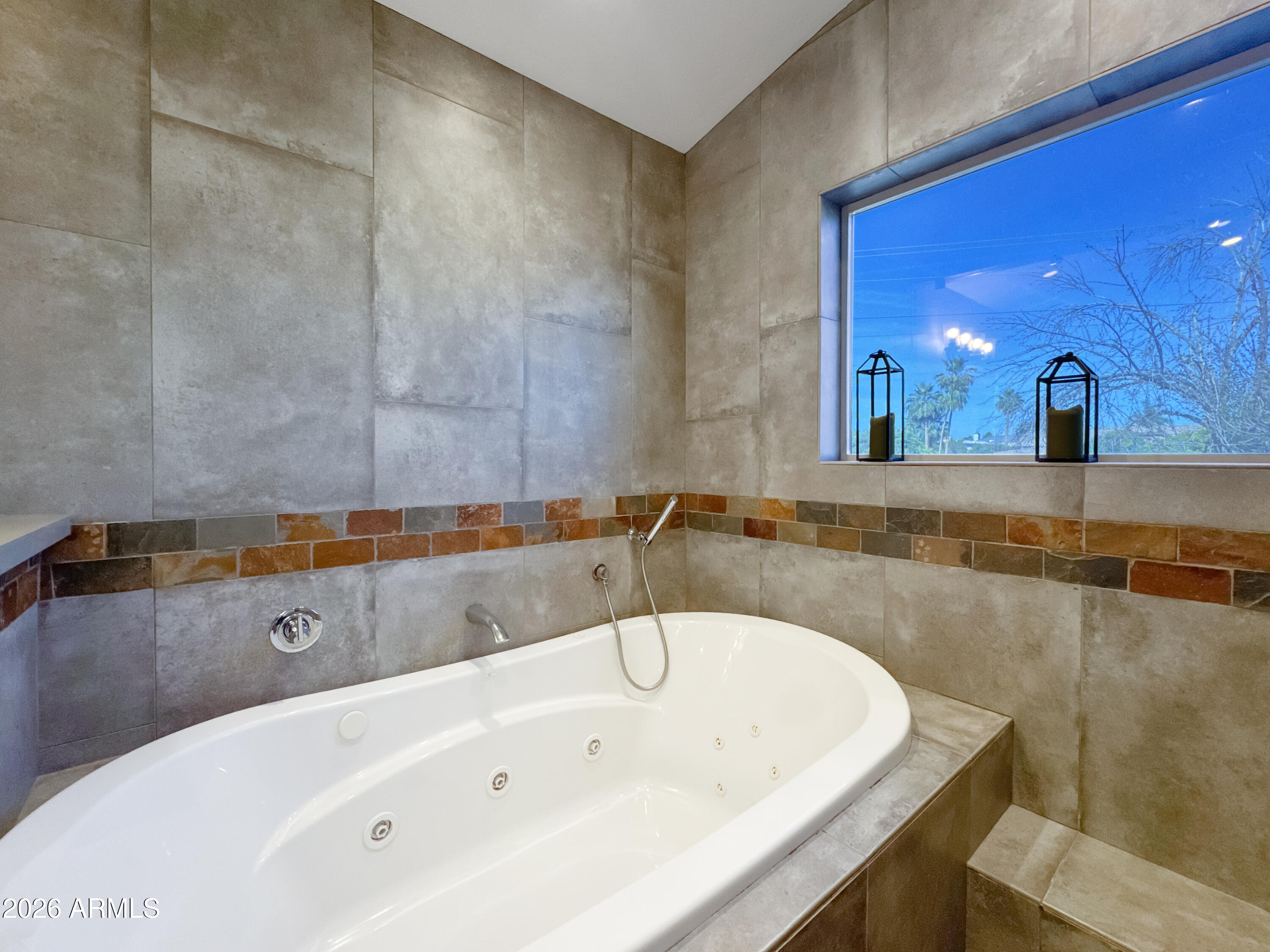 603 North Almar Circle Mesa, AZ 85213 - Photo 16 of 31 a bathroom with a bathtub and a sink