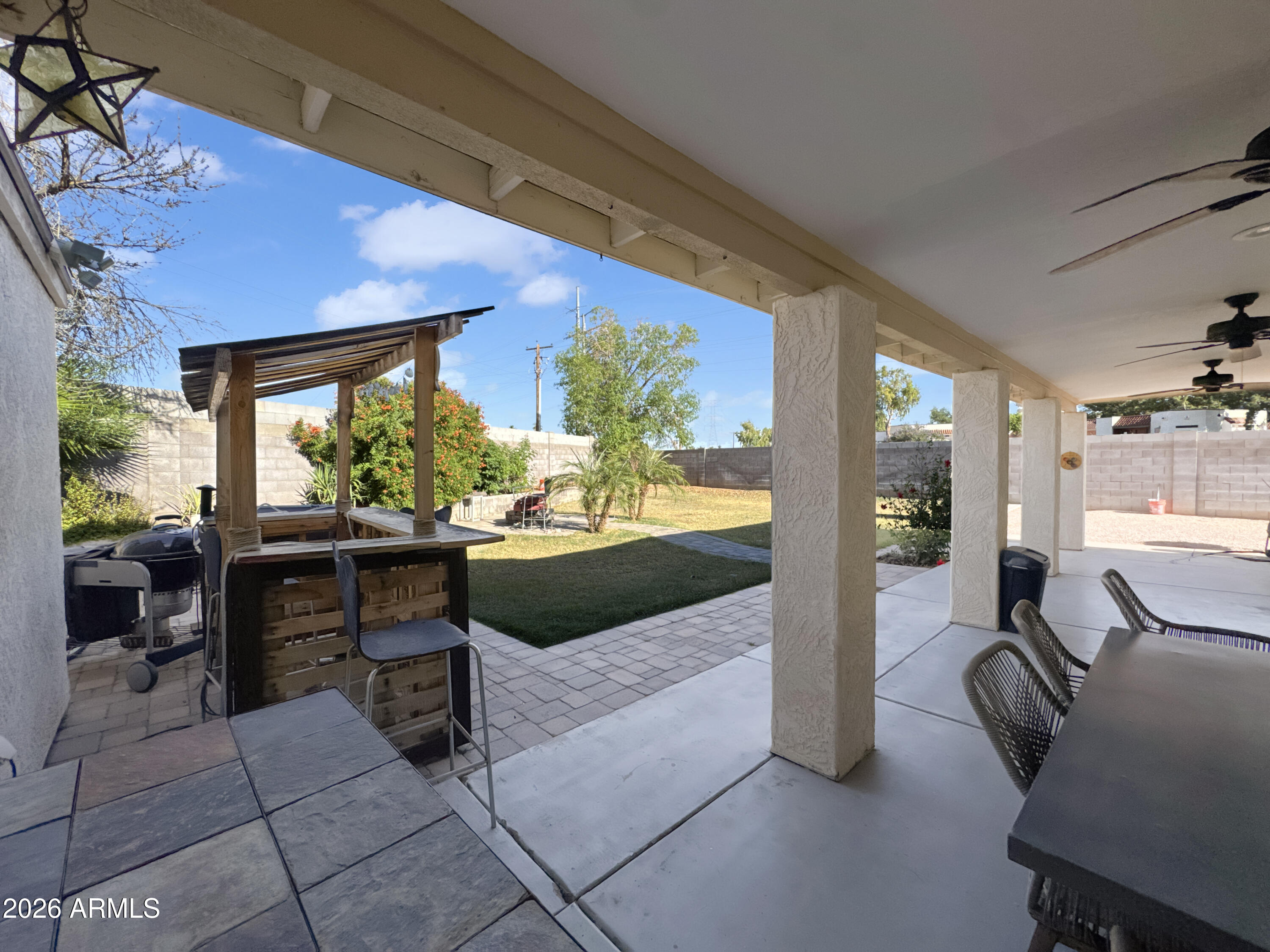 603 North Almar Circle Mesa, AZ 85213 - Photo 27 of 31 a view of a dining room with furniture window and outside view