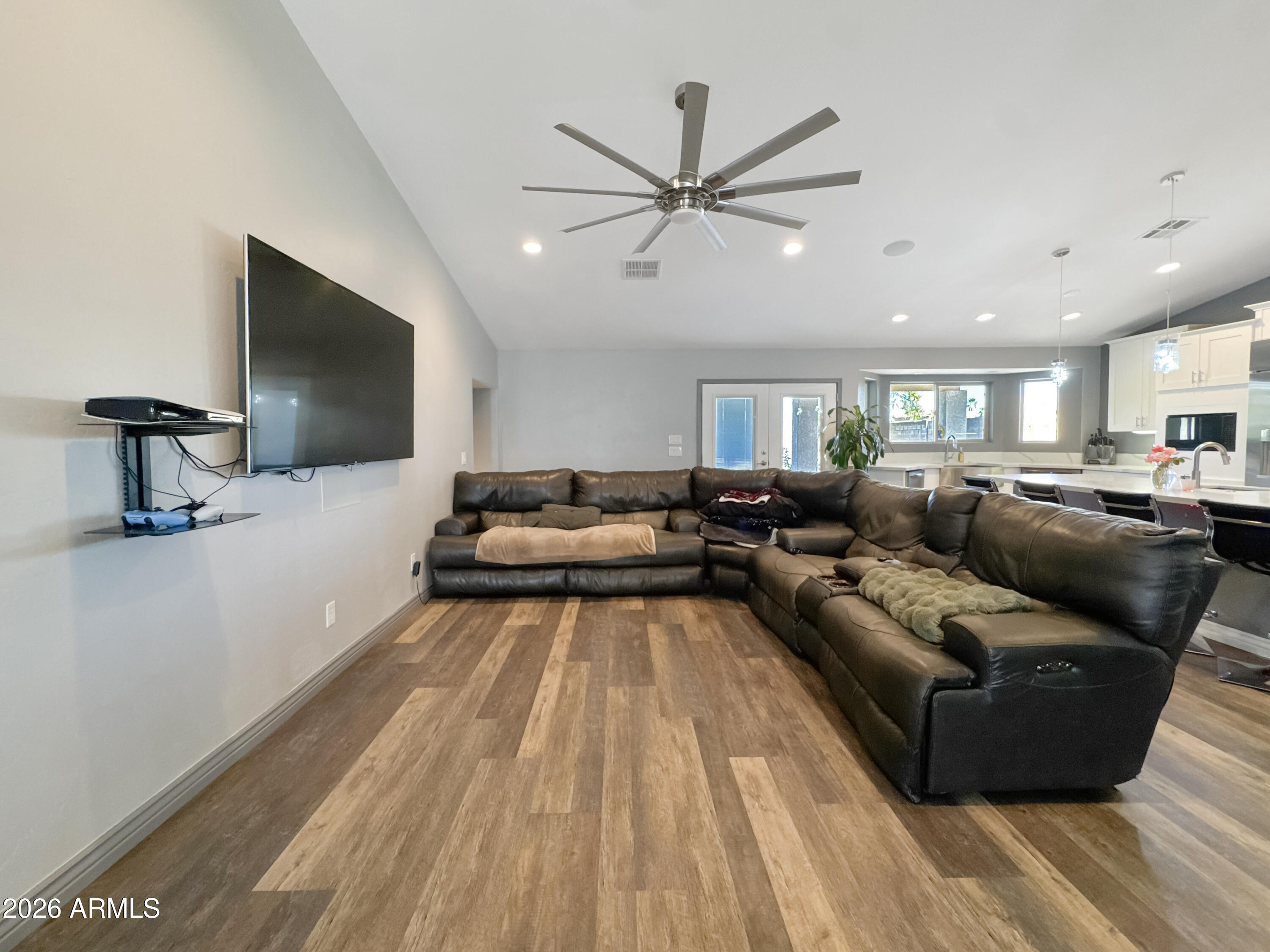 603 North Almar Circle Mesa, AZ 85213 - Photo 5 of 31 a living room with furniture and a flat screen tv