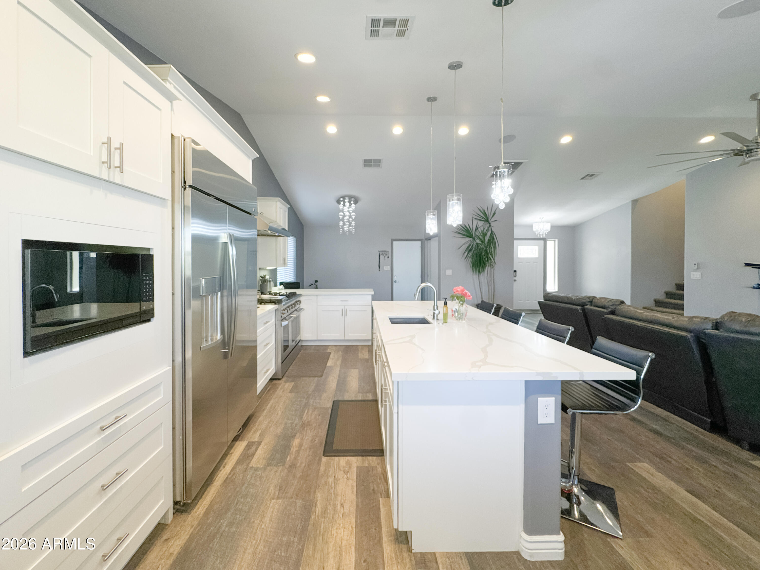 603 North Almar Circle Mesa, AZ 85213 - Photo 9 of 31 a large kitchen with a table and chairs