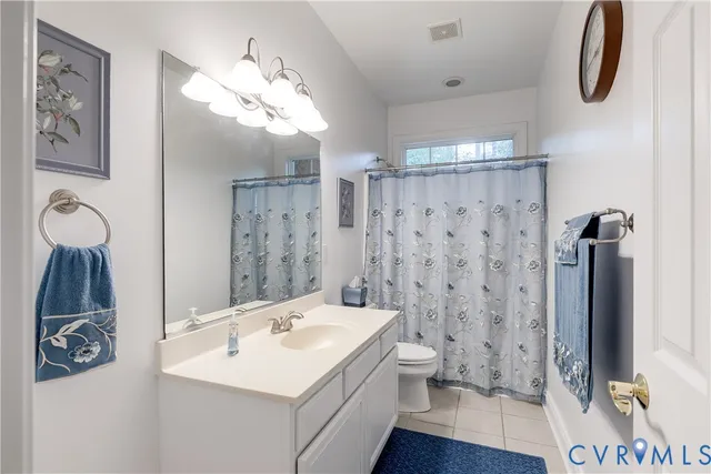 a bathroom with a sink a mirror and a shower