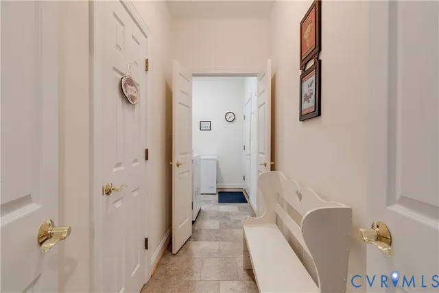 a bathroom with a tub and shower