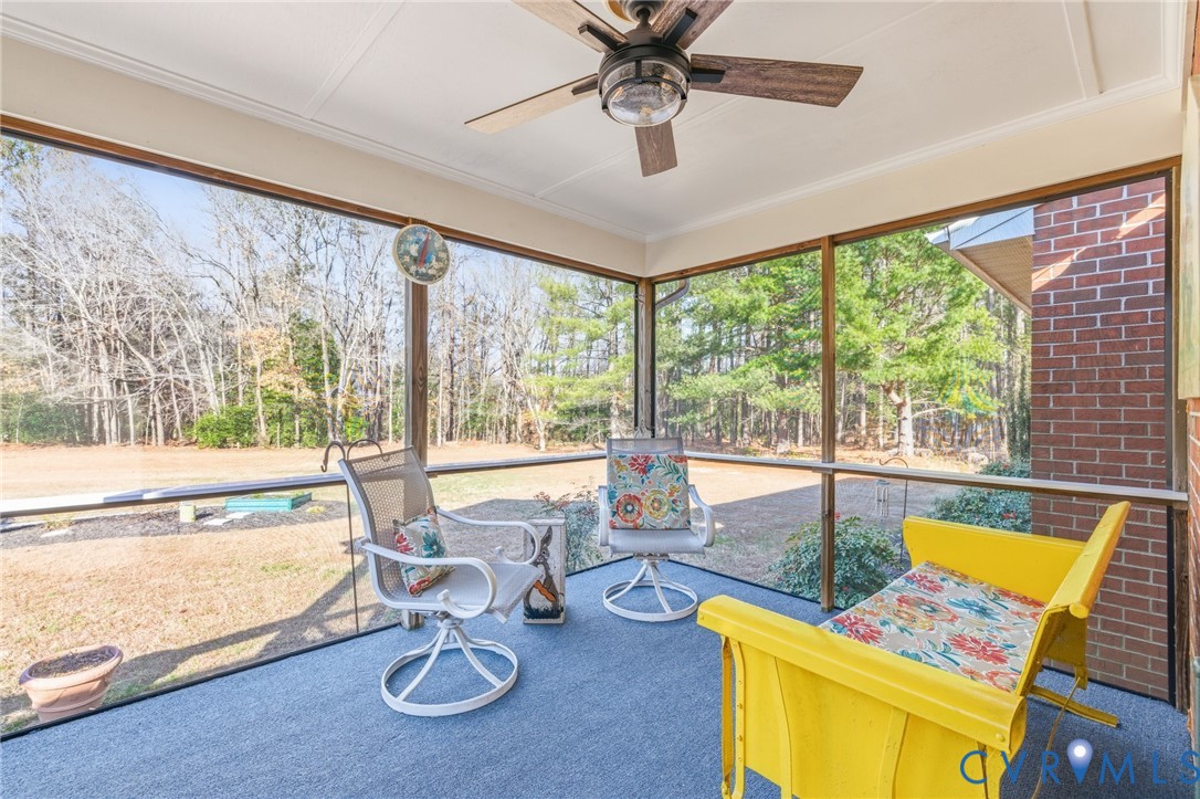 6606 West Quaker Road Disputanta, VA 23842 - Photo 30 of 32 Sunroom with ceiling fan