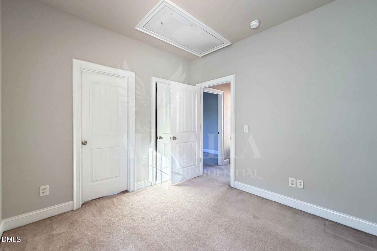 7754 ACC Boulevard Raleigh, NC 27617 - Photo 21 of 41 an empty room with closet area