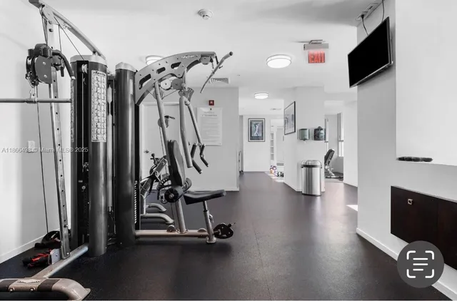 a view of a room with gym equipment