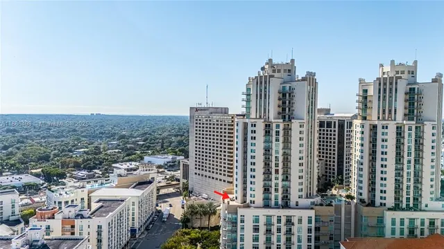 a view of city with tall buildings