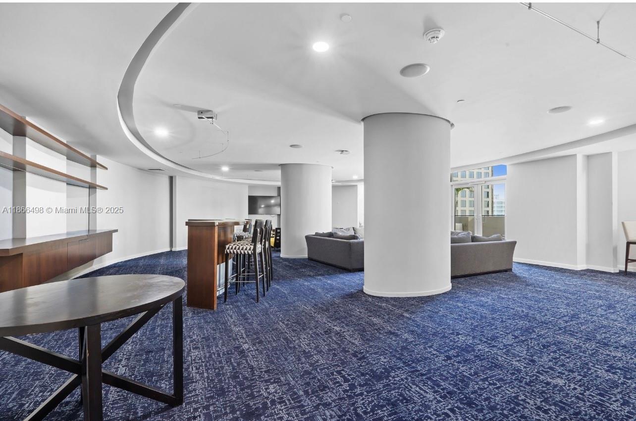 9055 Southwest 73rd Court, Unit 207 Miami, FL 33156 - Photo 10 of 22 a view of work space with furniture and window