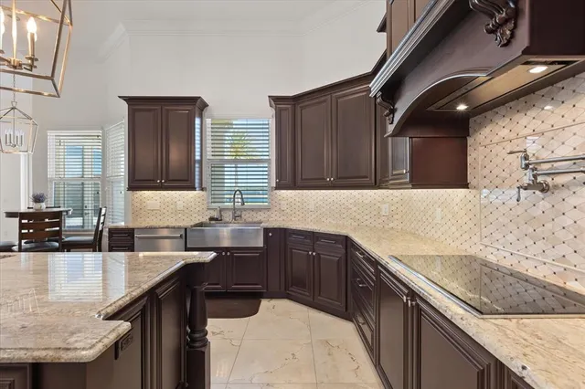 a large bed sitting in a spacious bedroom next to a window