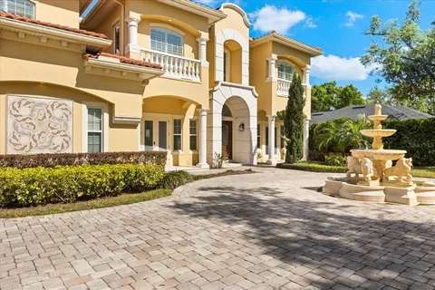 a view of a yard in front of a house