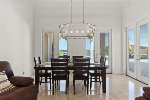 a bedroom with a bed and a chair