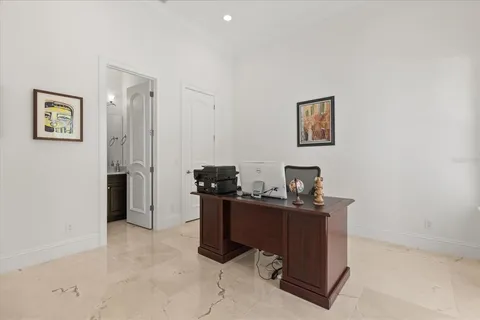 a view of a swimming pool with an outdoor space and seating area