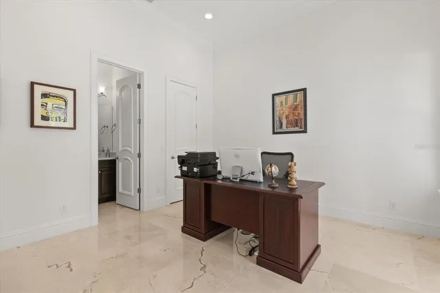 a view of a swimming pool with an outdoor space and seating area