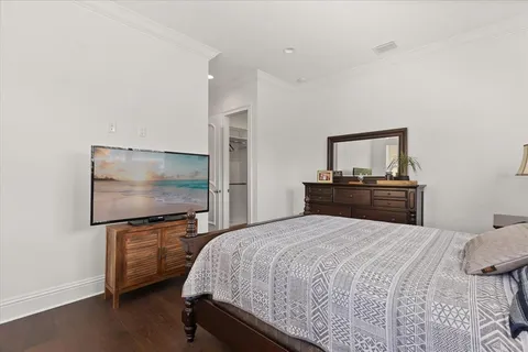 a front view of house with yard and swimming pool