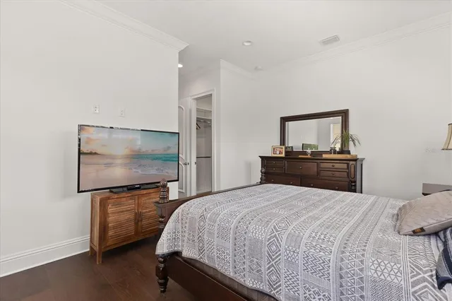 a front view of house with yard and swimming pool