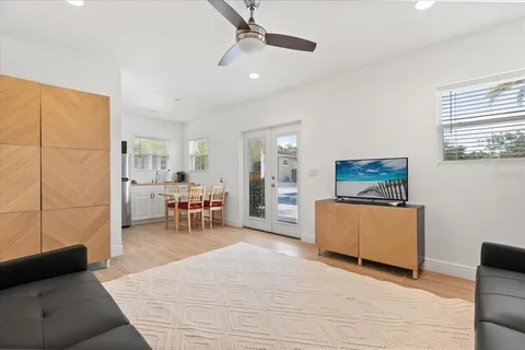 a view of a swimming pool with a table and chairs
