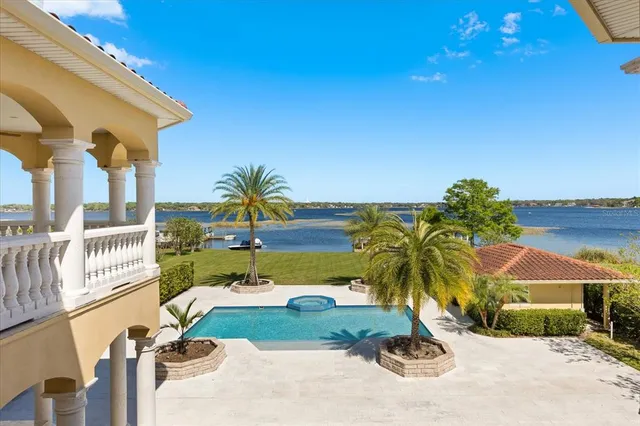 a view of a livingroom with furniture and front door
