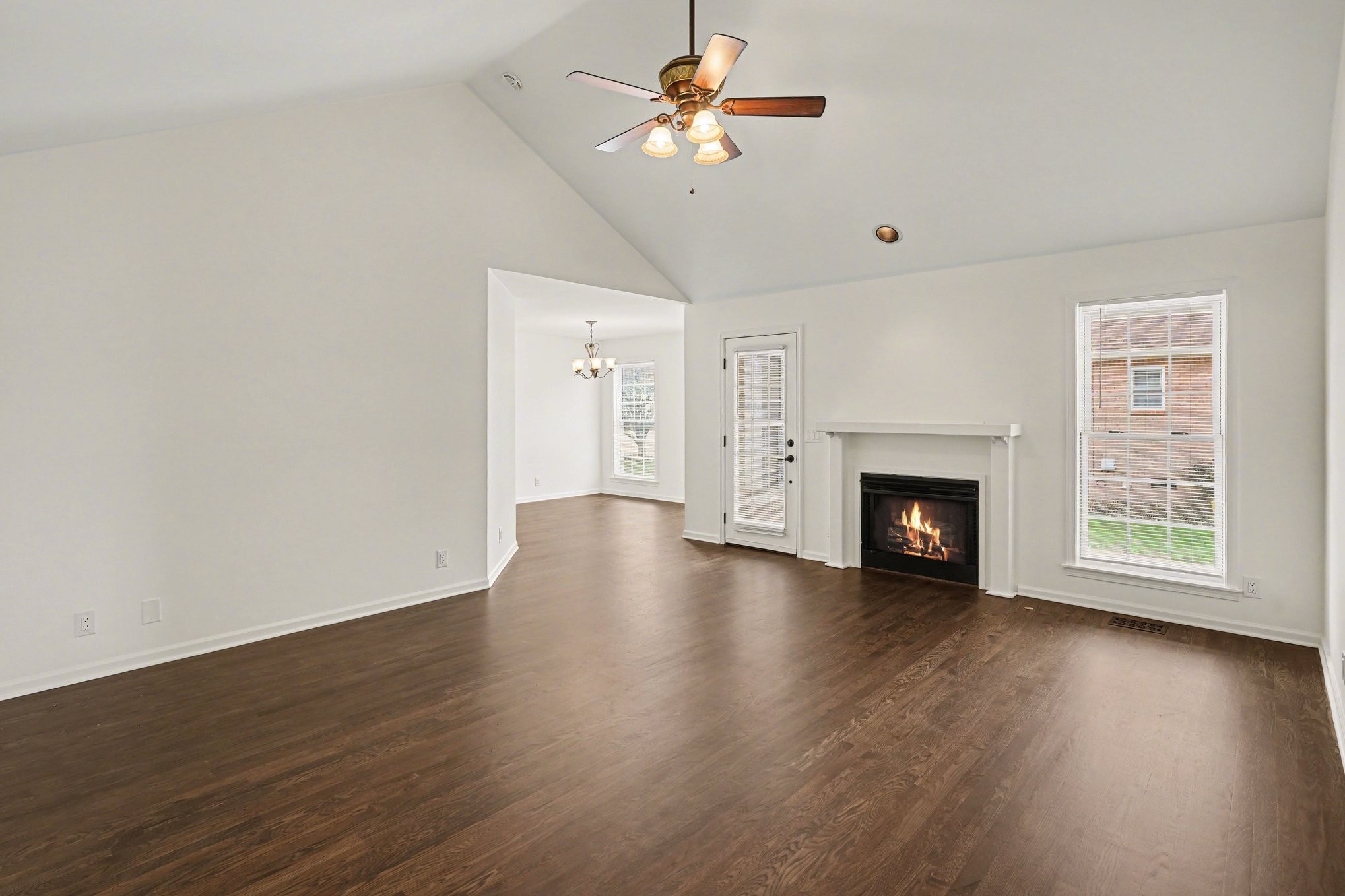161 Fieldstone Lane Springfield, TN 37172 - Photo 4 of 26 a view of empty room with wooden floor and fireplace