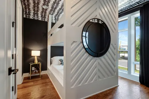 a view of a bedroom with washer and dryer