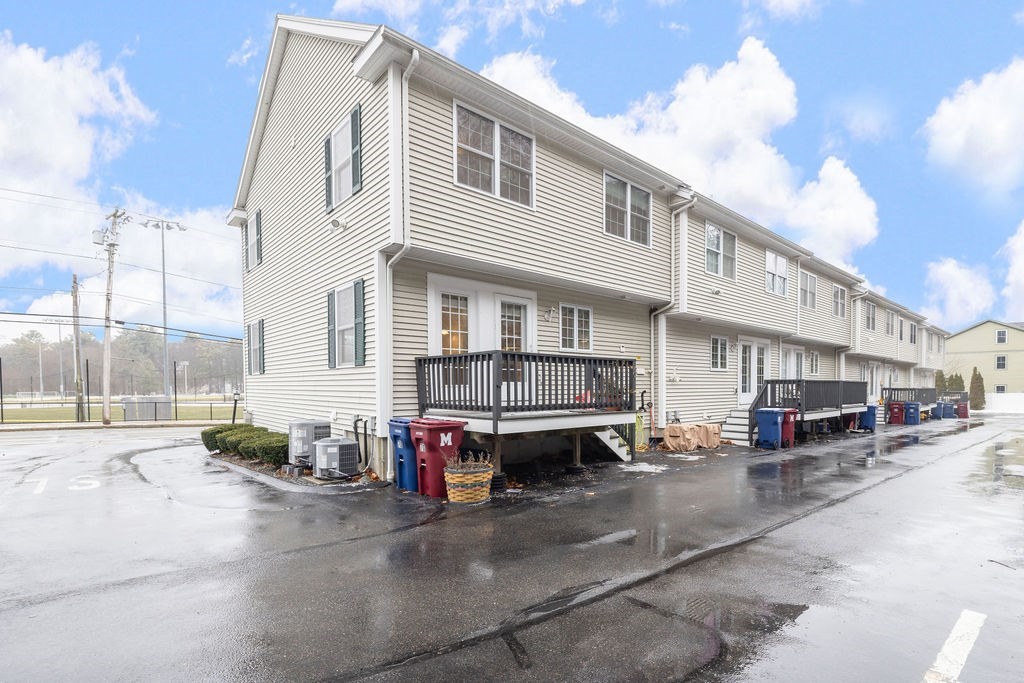70 Sylvan Street, Unit 70 Melrose, MA 02176 - Photo 20 of 20 a view of a street with cars