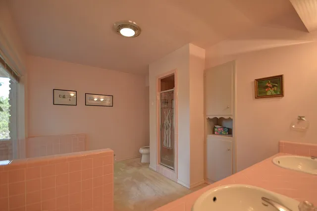 a view of a room with a large window