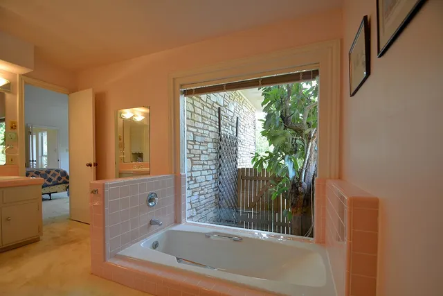 a view of a livingroom with a hallway